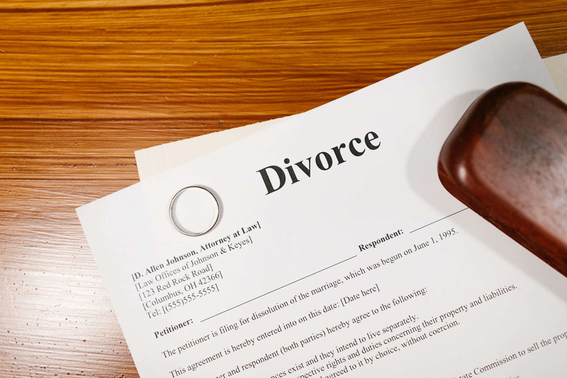 A ring resting on top of a legal document