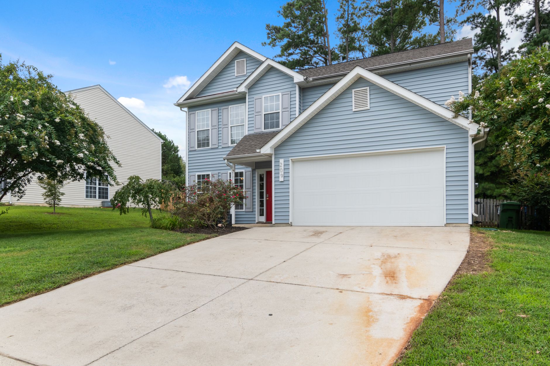 A suburban home exterior on a quiet street